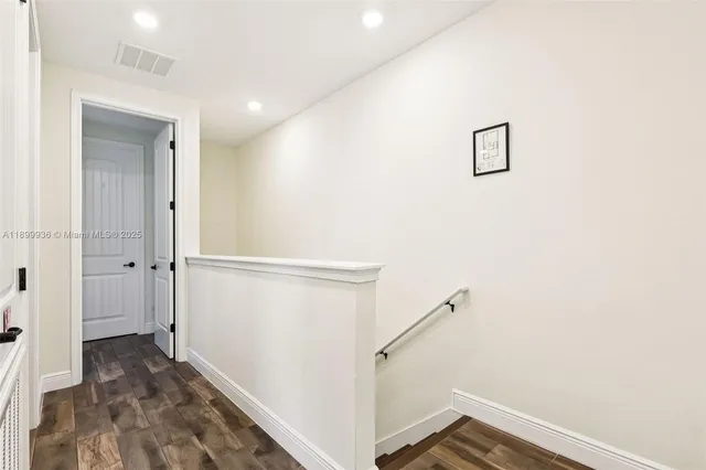a view of a hallway with closet