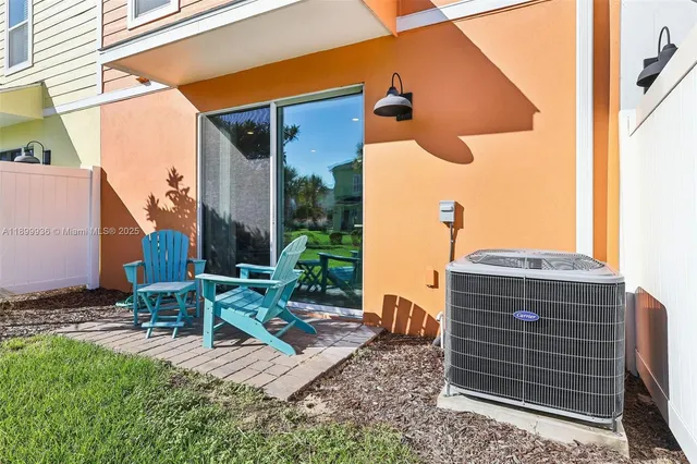 a view of backyard with wheel chair potted plants and wooden roof