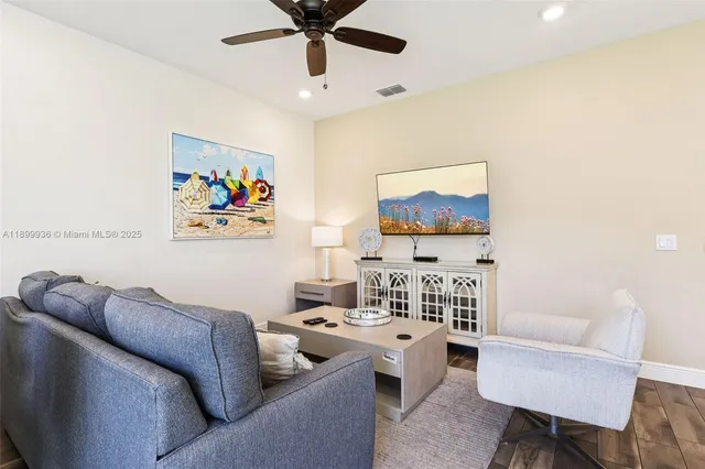 a living room with furniture and a couch