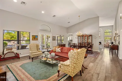 a living room with furniture and a table