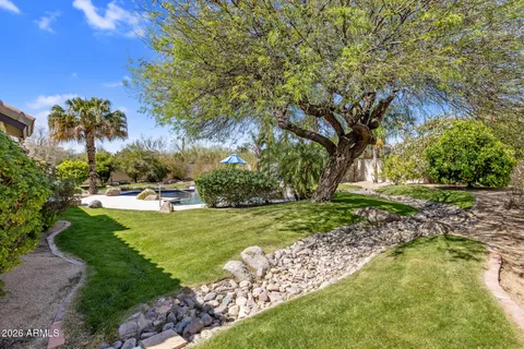 a view of backyard with green space