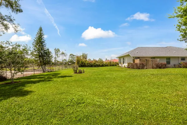 a view of a house with a big yard