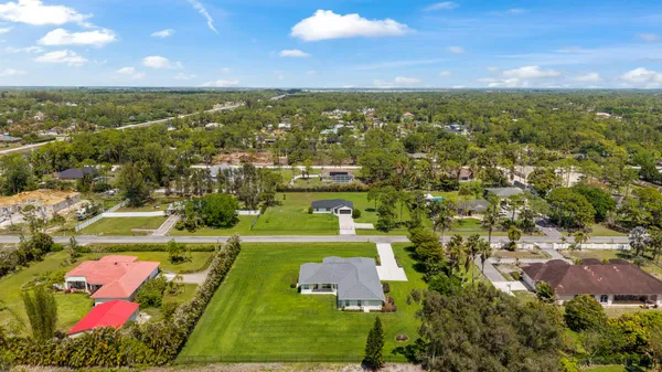 an aerial view of a house with a garden