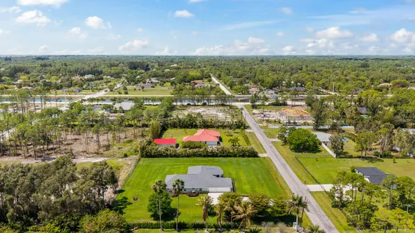 $1,050,000 | 12878 70th Place North, The Acreage, FL 33412