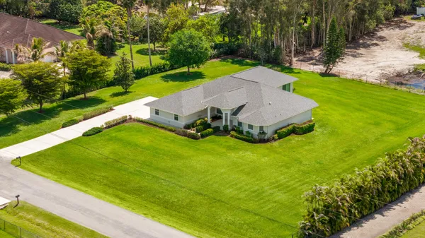 $1,050,000 | 12878 70th Place North, The Acreage, FL 33412