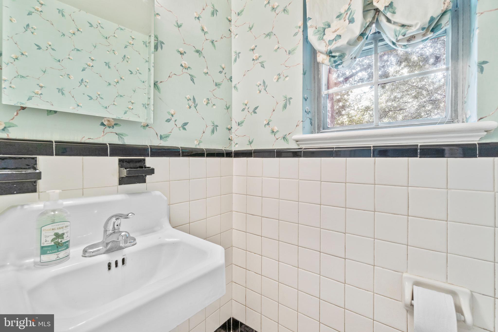 9002 Walden Road Silver Spring, MD 20901 - Photo 6 of 23 Main level powder room.