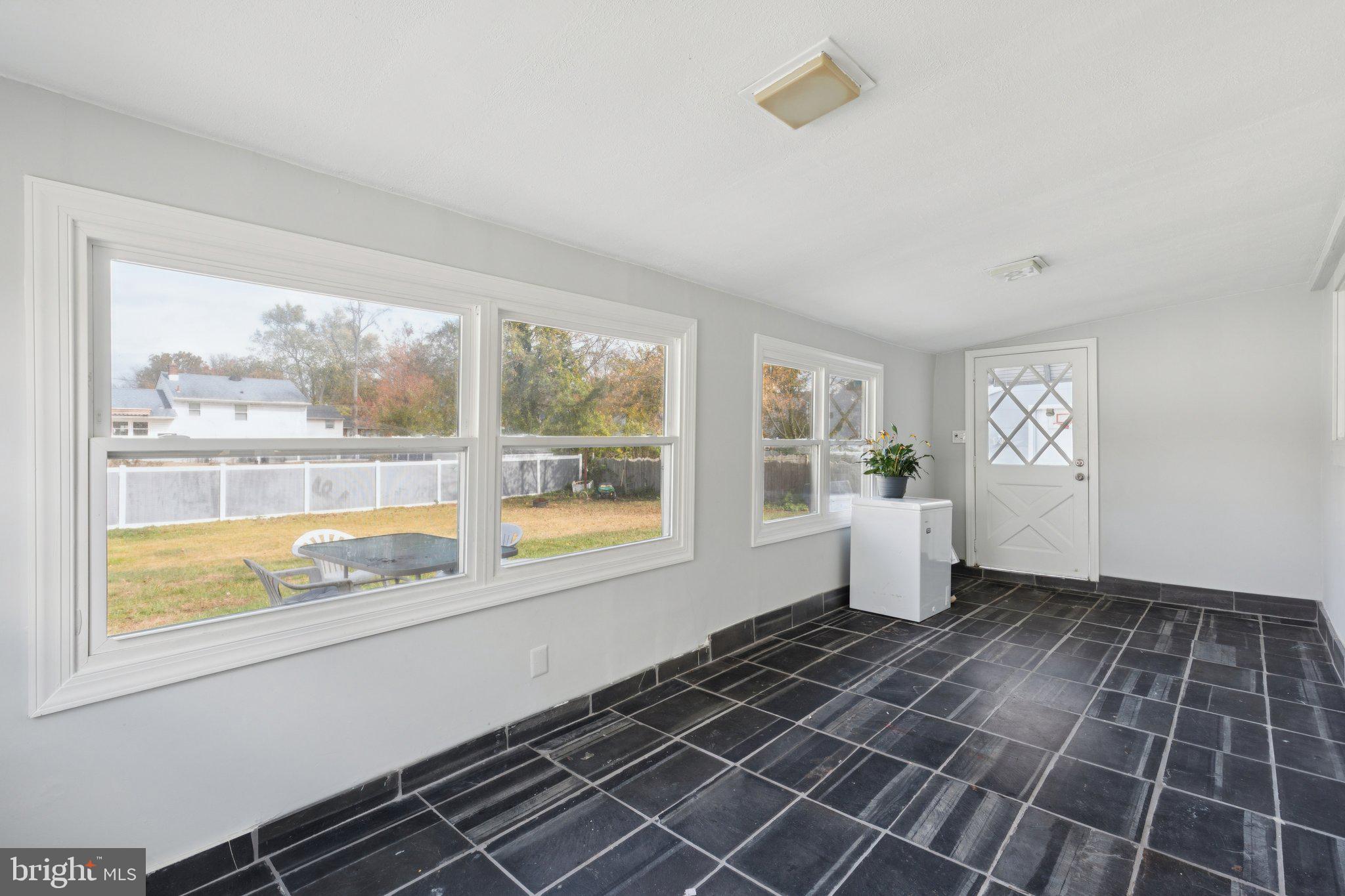 407 Yorkshire Road Cherry Hill, NJ 08034 - Photo 17 of 62 a view of an empty room with a window