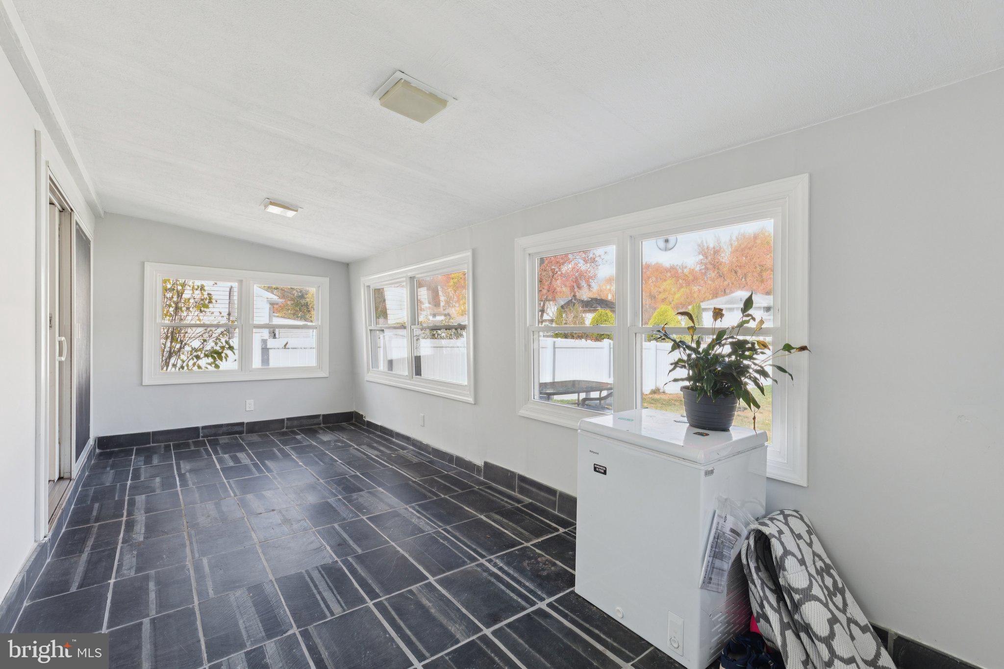407 Yorkshire Road Cherry Hill, NJ 08034 - Photo 18 of 62 a view of an entryway with wooden floor