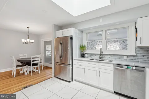 a workspace with furniture and a window