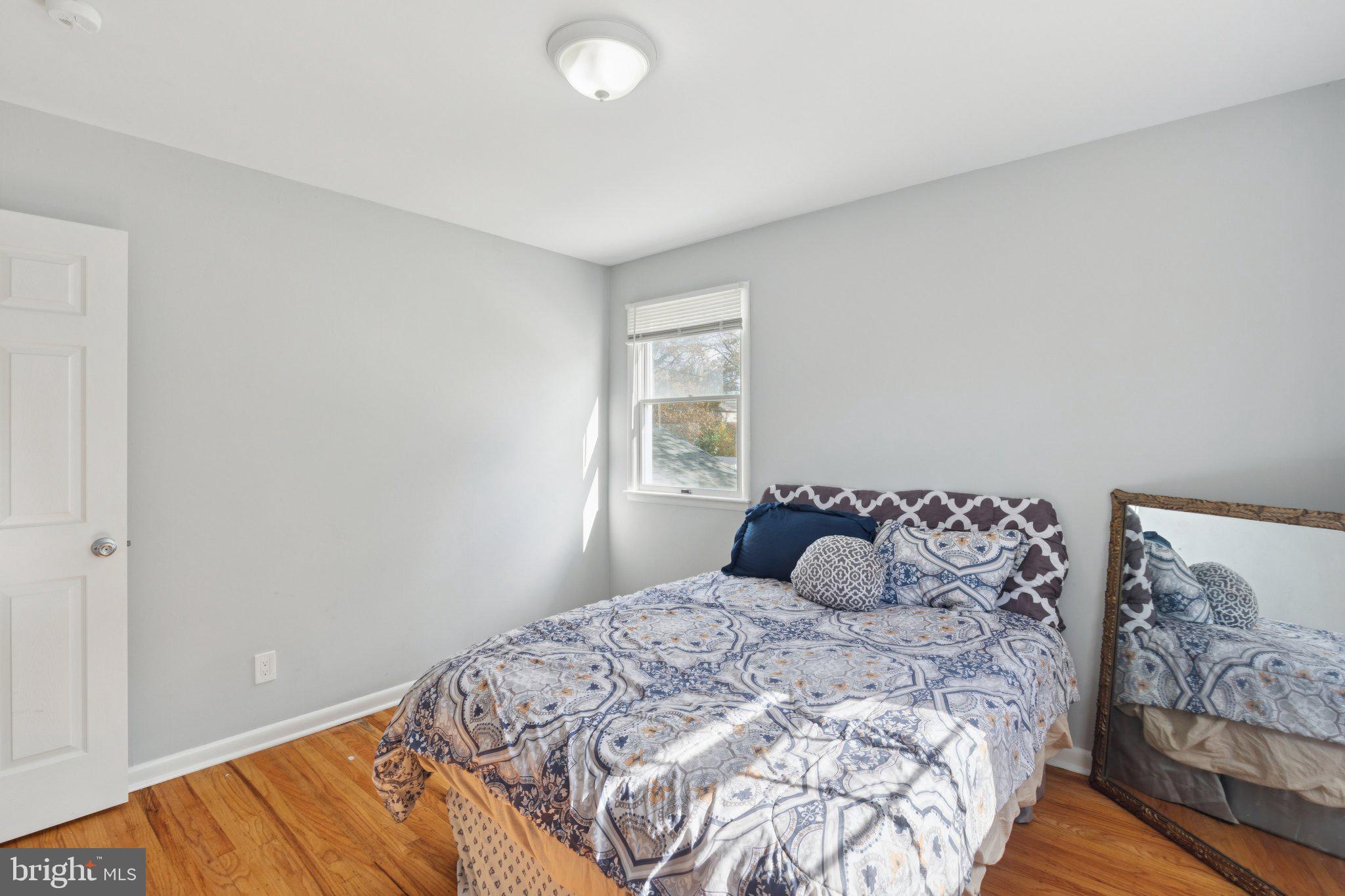 407 Yorkshire Road Cherry Hill, NJ 08034 - Photo 31 of 62 a bedroom with a bed and a window