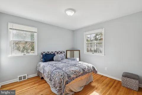 a bathroom with a shower and toilet