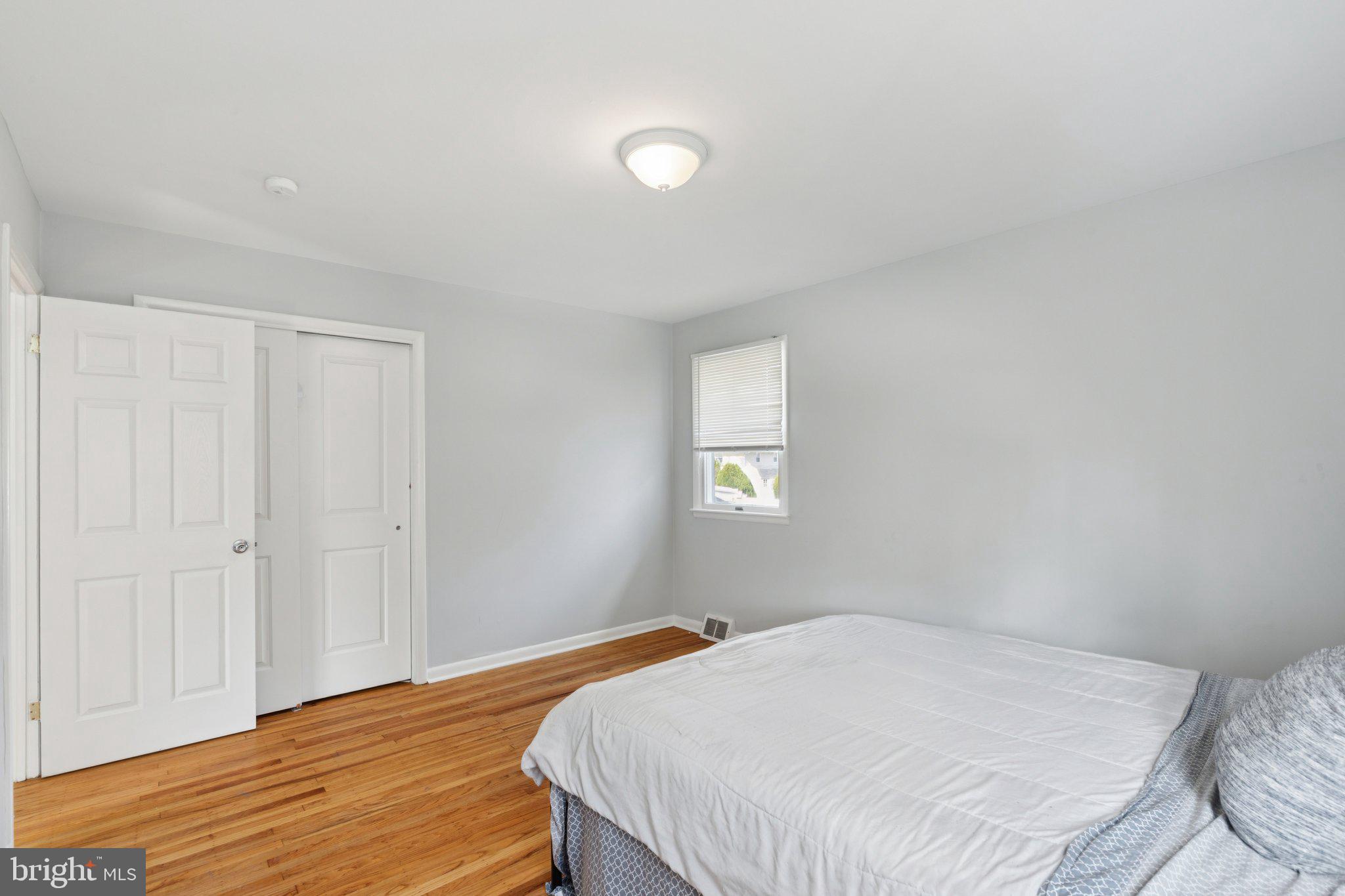 407 Yorkshire Road Cherry Hill, NJ 08034 - Photo 34 of 62 a bedroom with a bed and a window