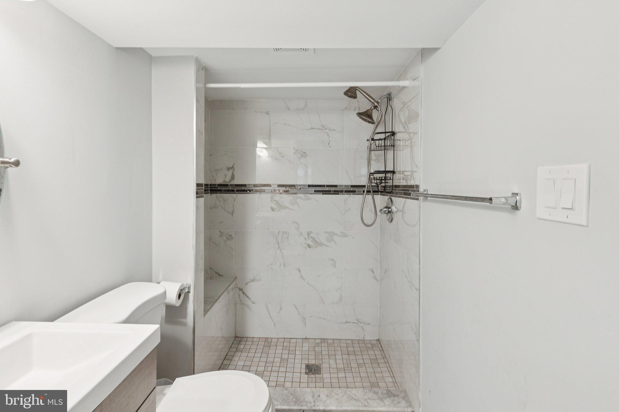 407 Yorkshire Road Cherry Hill, NJ 08034 - Photo 41 of 62 a bathroom with a shower and toilet