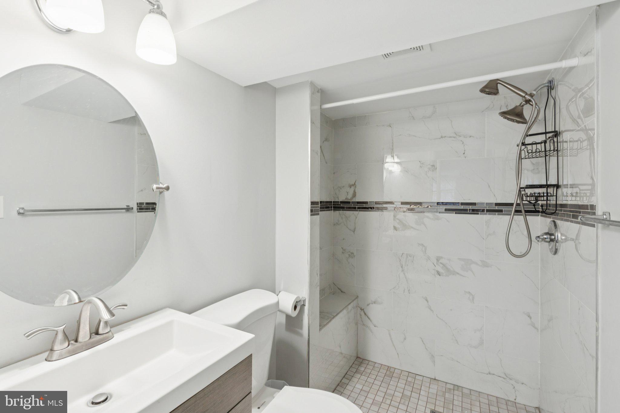 407 Yorkshire Road Cherry Hill, NJ 08034 - Photo 42 of 62 a bathroom with a sink toilet and shower