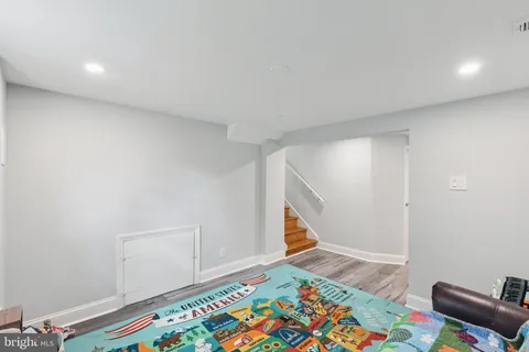 a view of a swimming pool with a lounge chairs