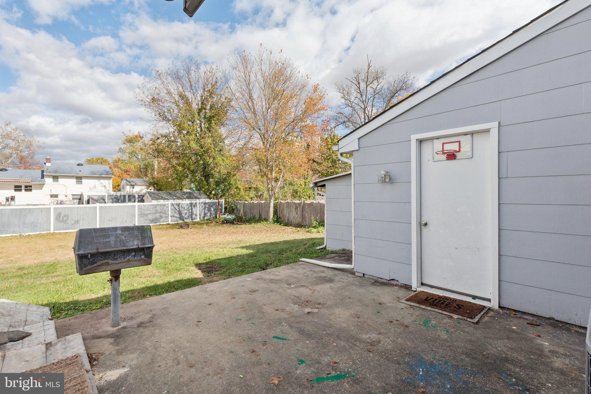407 Yorkshire Road Cherry Hill, NJ 08034 - Photo 49 of 62 a view of backyard with a garden and trees