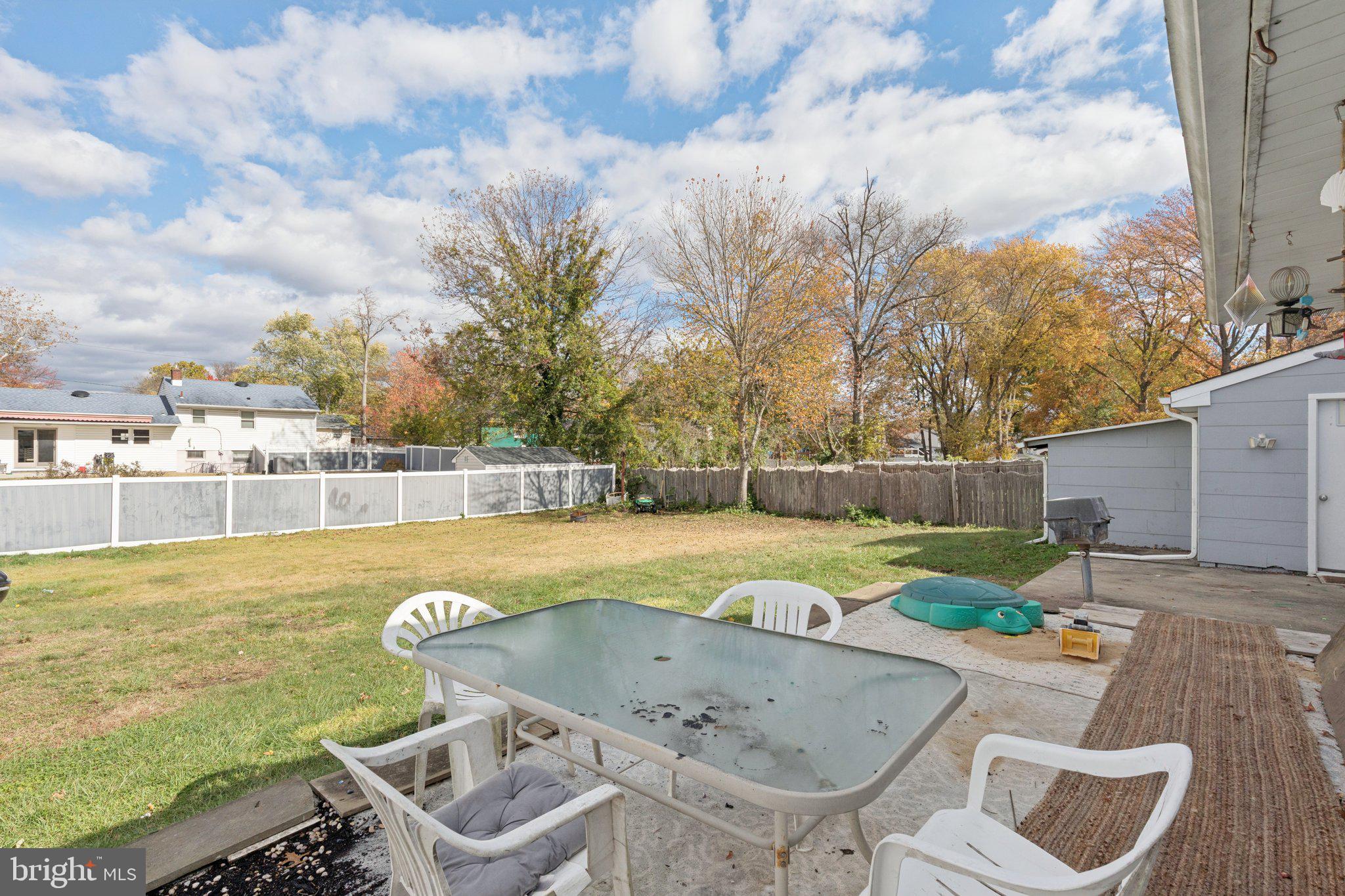 407 Yorkshire Road Cherry Hill, NJ 08034 - Photo 54 of 62 a view of a swimming pool with a lounge chairs