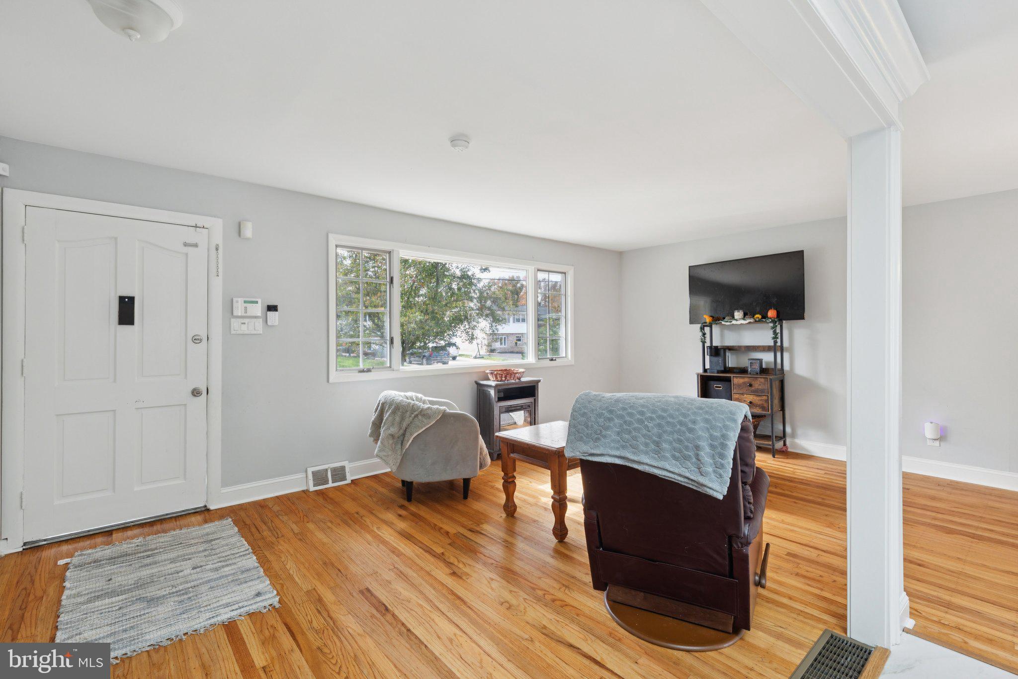407 Yorkshire Road Cherry Hill, NJ 08034 - Photo 8 of 62 a living room with furniture and a window