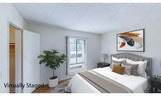 a view of walk in closet with window