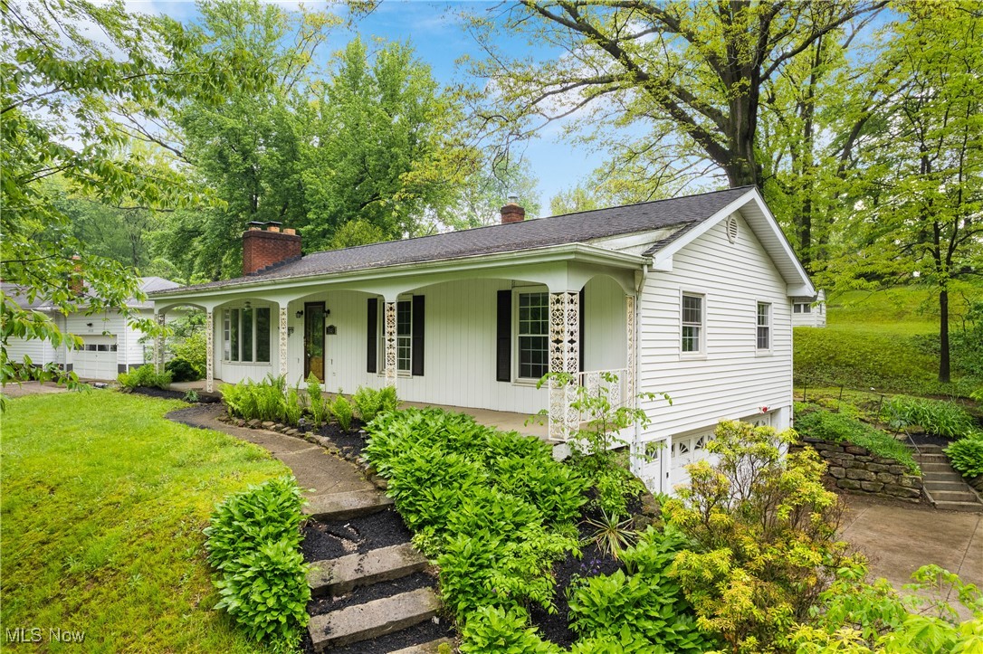 3143 Ethan Allen Road Barberton, OH 44203 - Photo 4 of 37 Ranch-style house with a chimney, a porch, and a front lawn