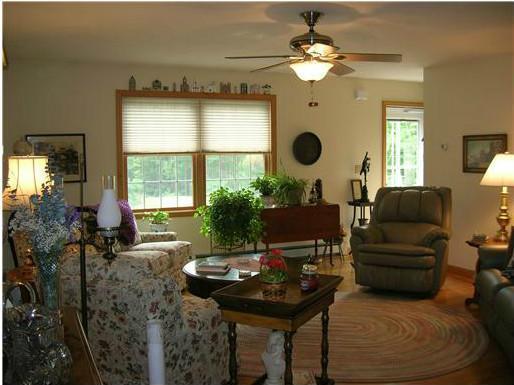 1041 Lewiston Road, Unit 1 Topsham, ME 04086 - Photo 7 of 26 Living Room. Light filled living room