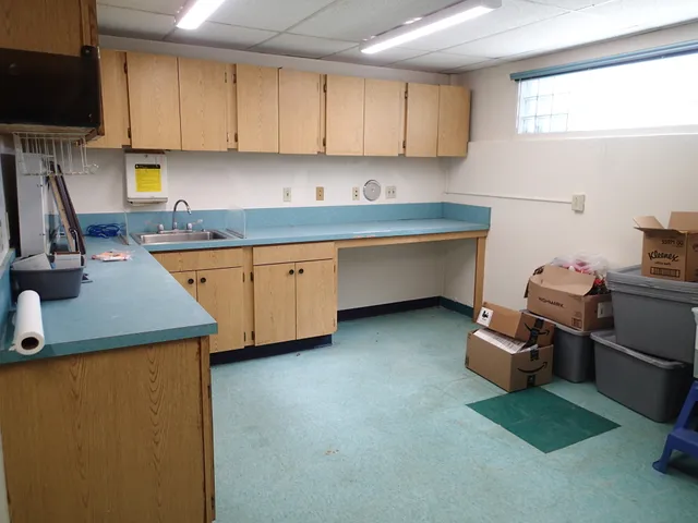 a room with furniture and a chair