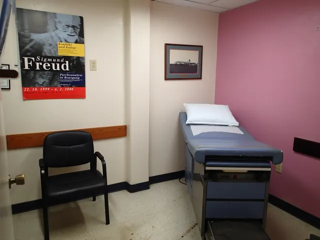 a kitchen with a cabinets and a chair