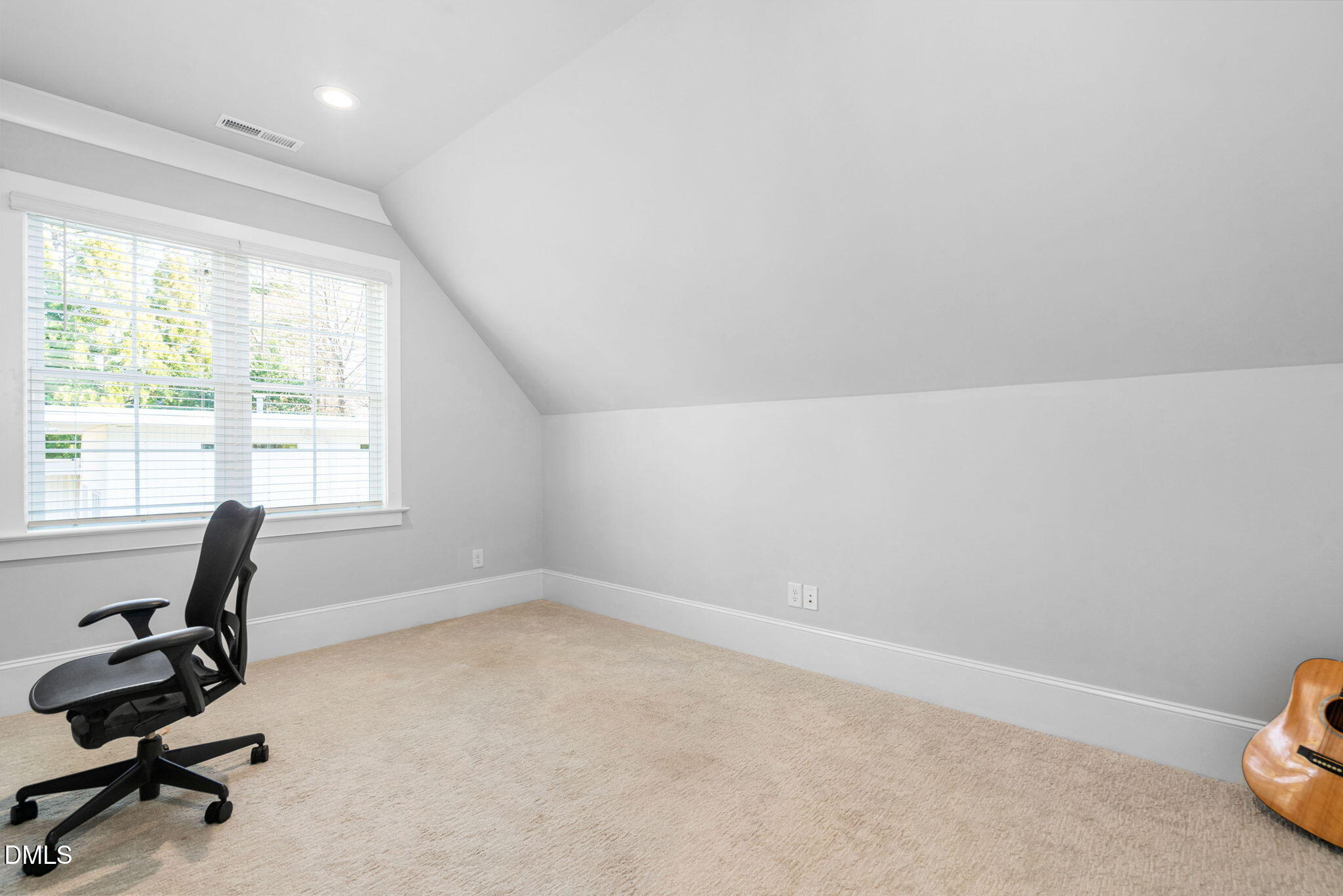 3417 Edgemont Drive Raleigh, NC 27612 - Photo 54 of 83 a view of a workspace with furniture and a window
