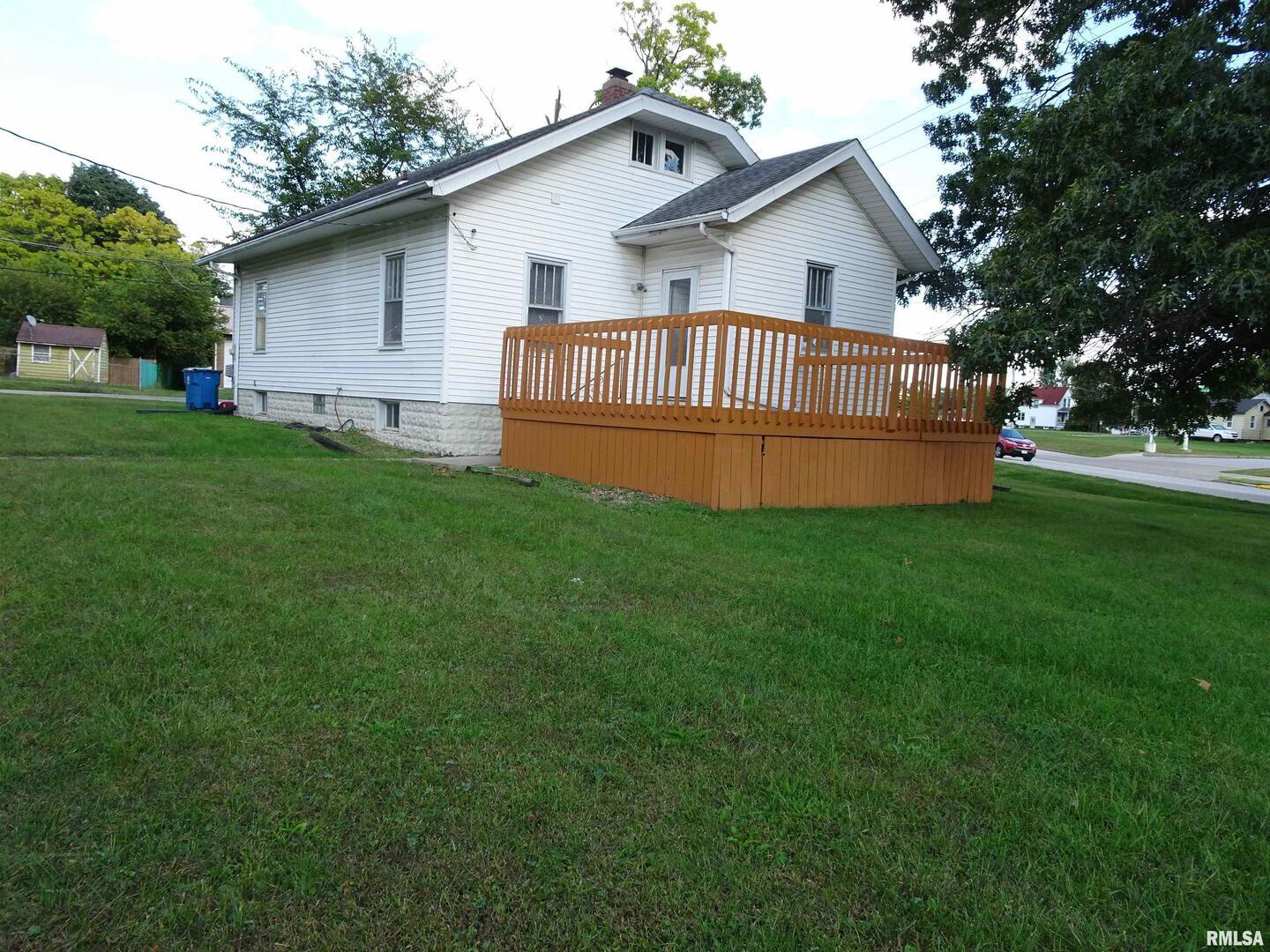 917 3rd Street Silvis, IL 61282 - Photo 13 of 22 a view of a house with a yard