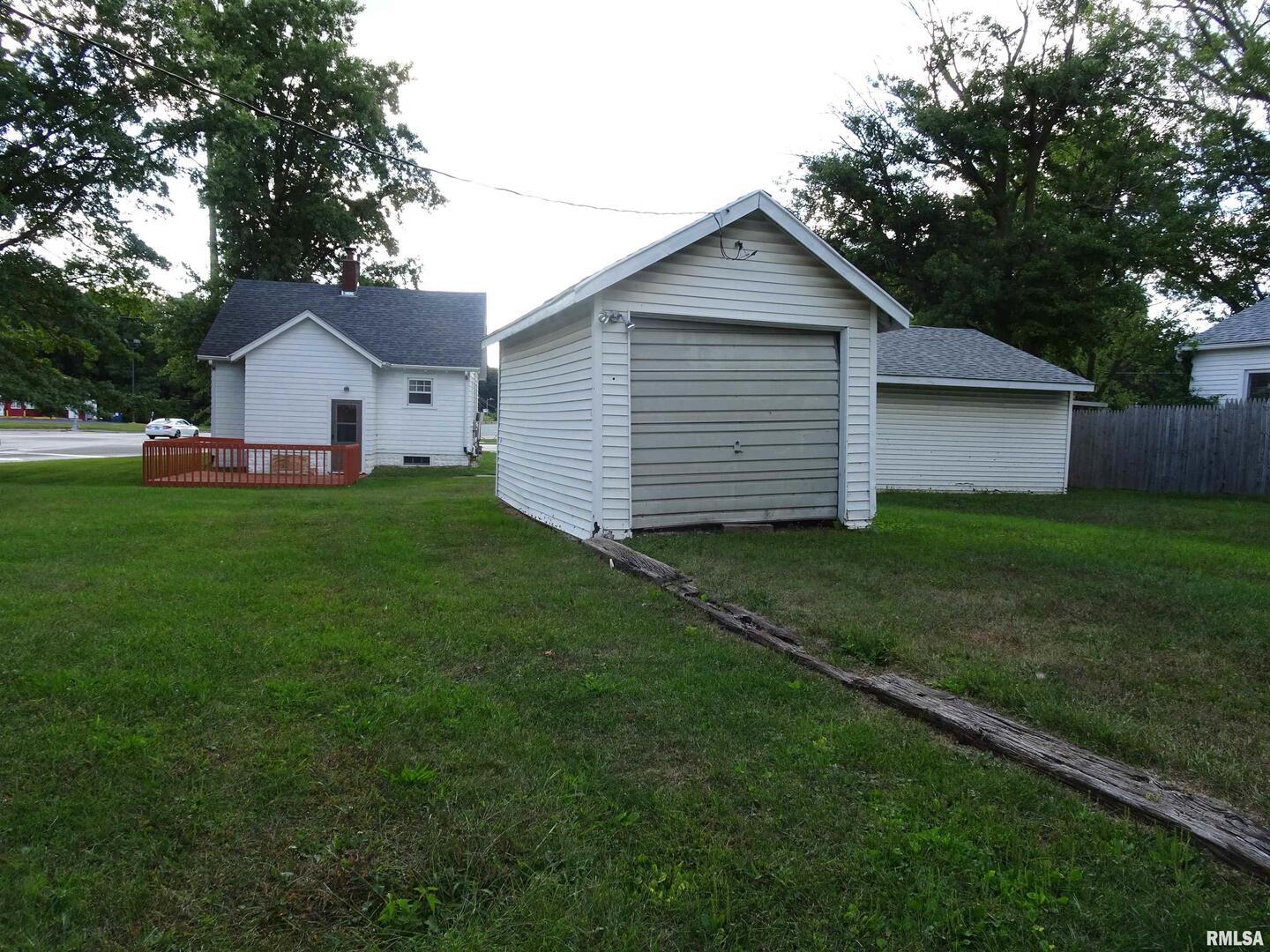 917 3rd Street Silvis, IL 61282 - Photo 15 of 22 a front view of house with yard and green space