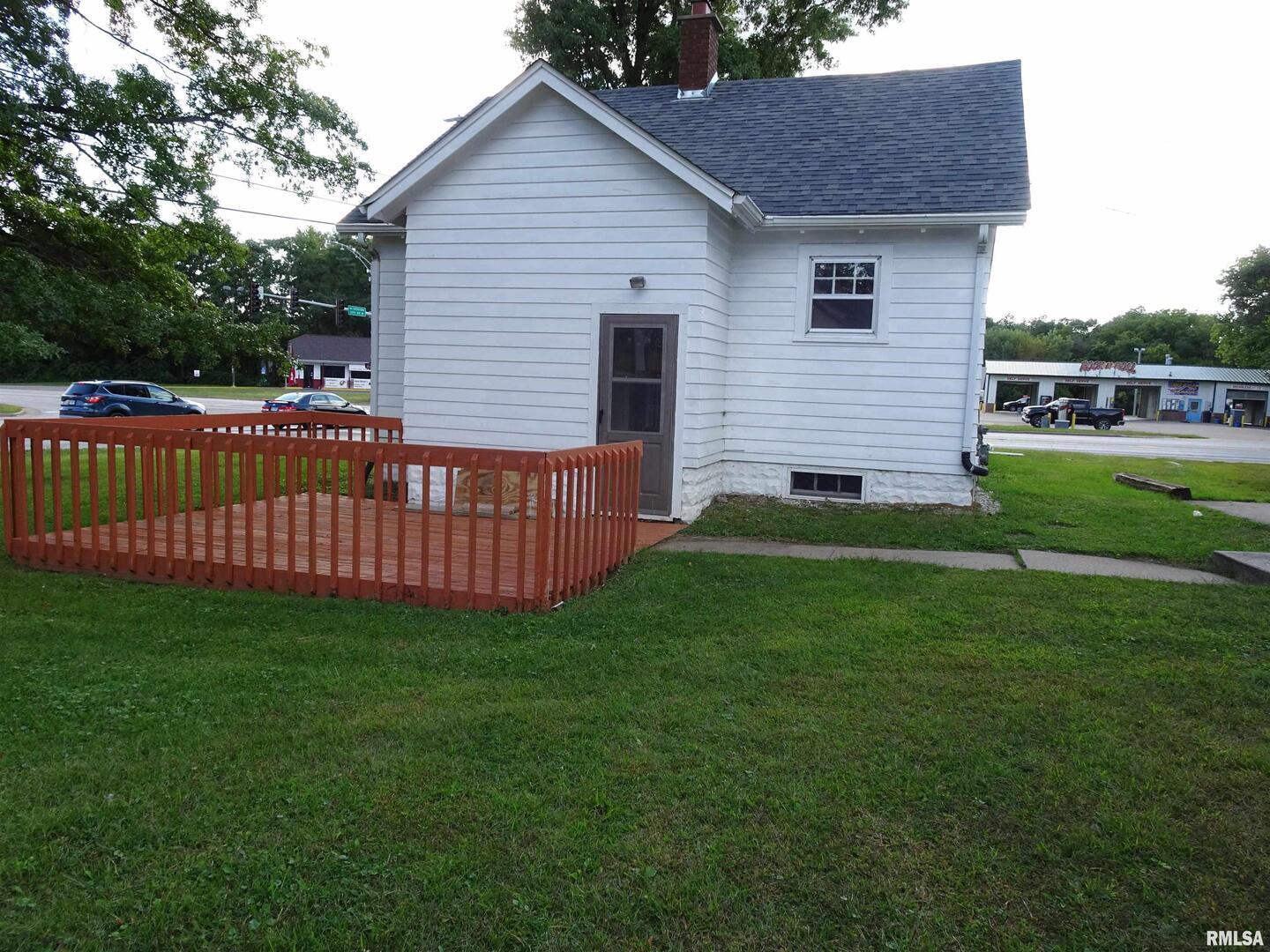 917 3rd Street Silvis, IL 61282 - Photo 22 of 22 a view of a house with a yard and deck