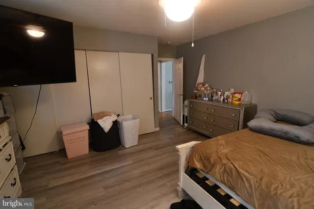 a bedroom with a bed and furniture