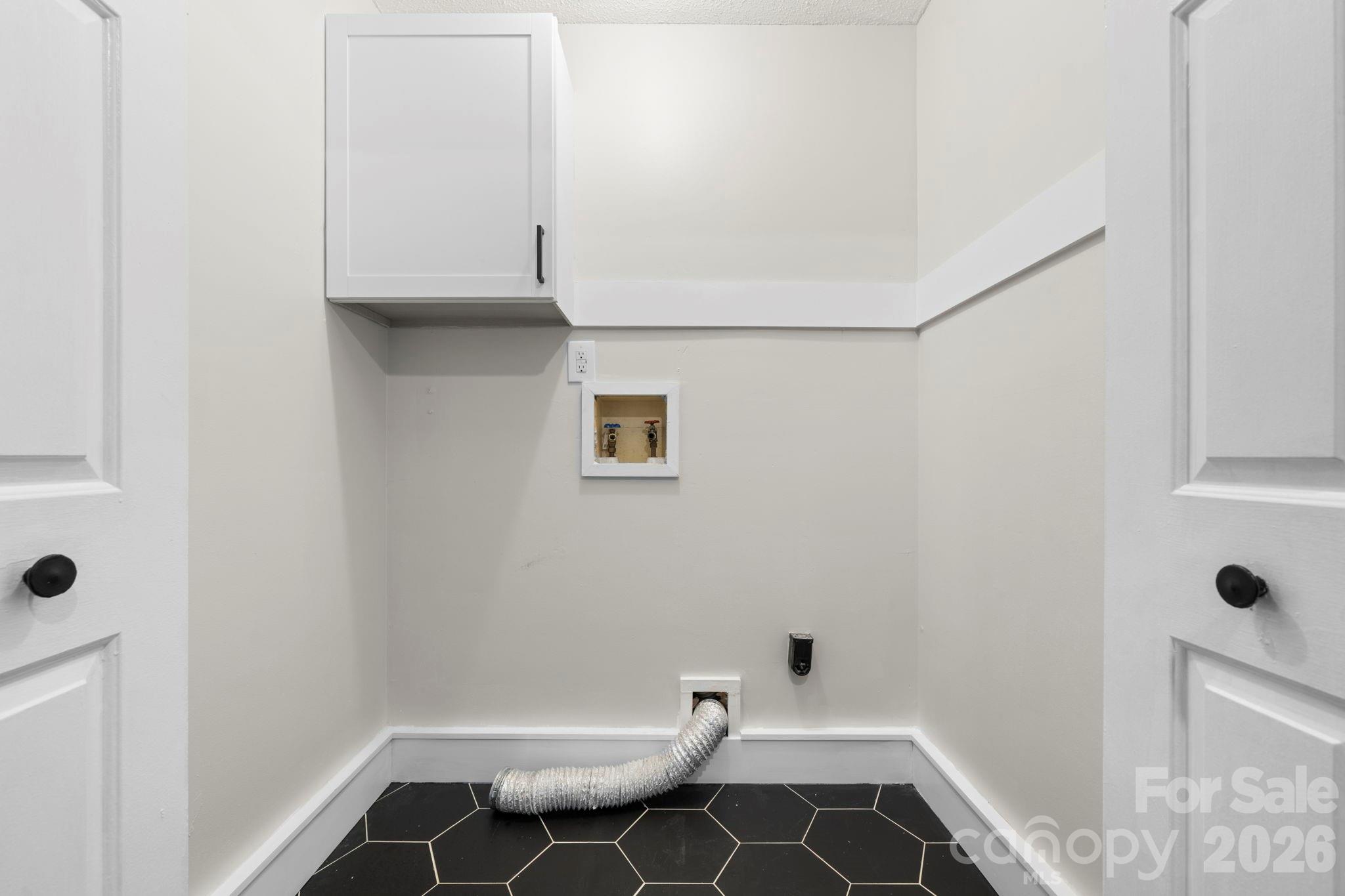 2705 North Center Street, Unit 60 Hickory, NC 28601 - Photo 18 of 27 a bathroom with a sink and shower
