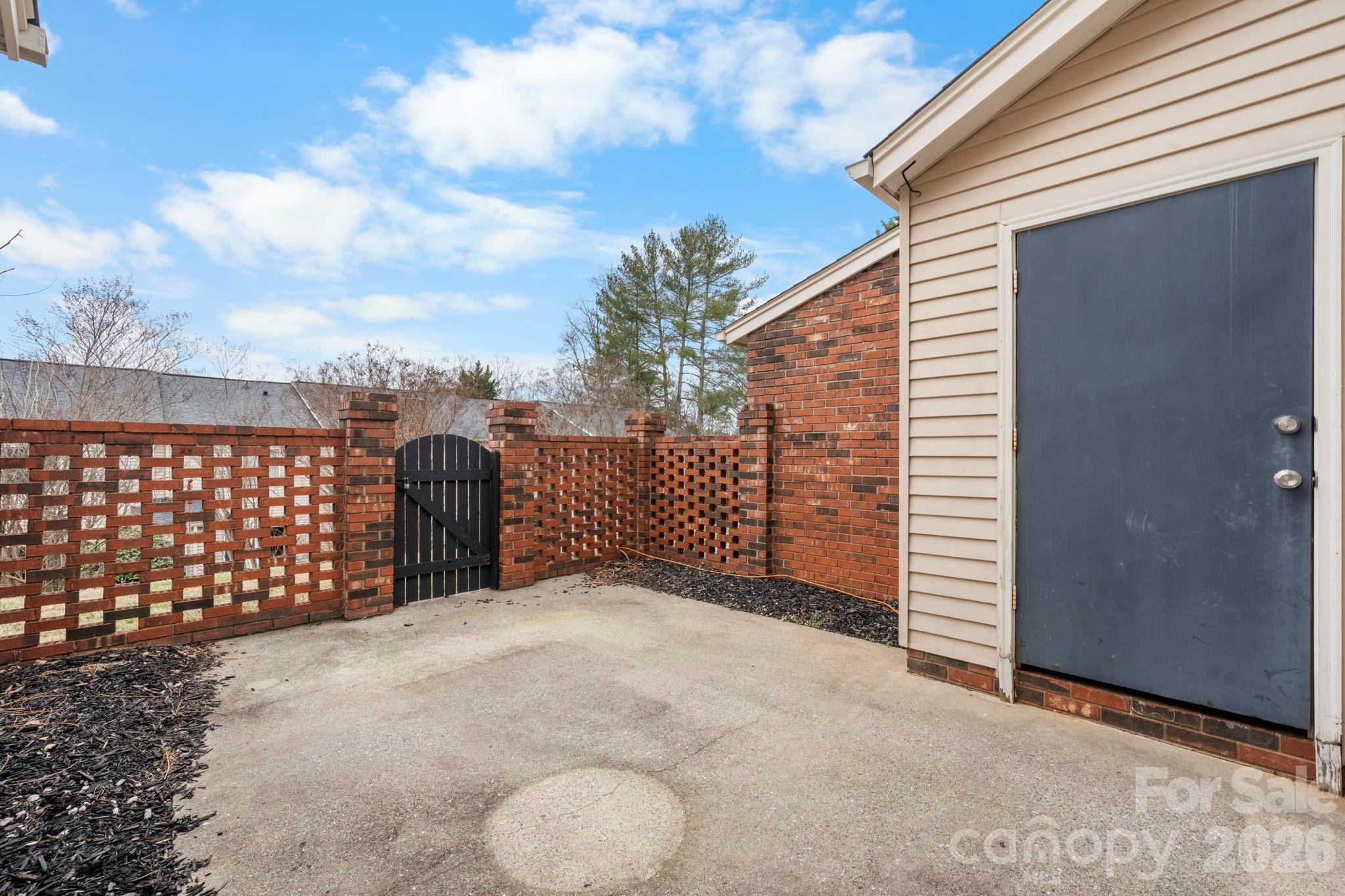 2705 North Center Street, Unit 60 Hickory, NC 28601 - Photo 19 of 27 a view of a fence