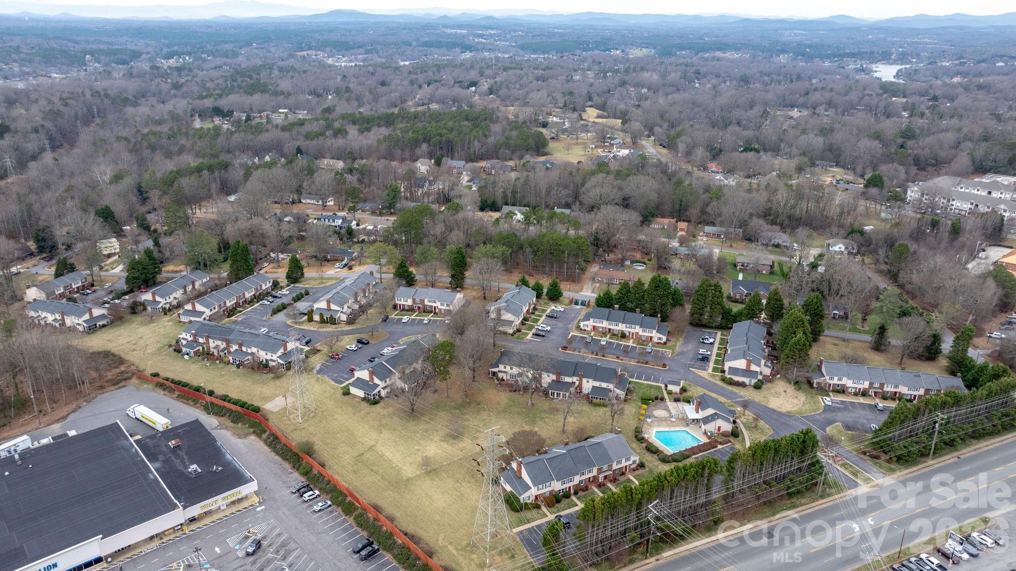2705 North Center Street, Unit 60 Hickory, NC 28601 - Photo 22 of 27 an aerial view of residential houses with outdoor space