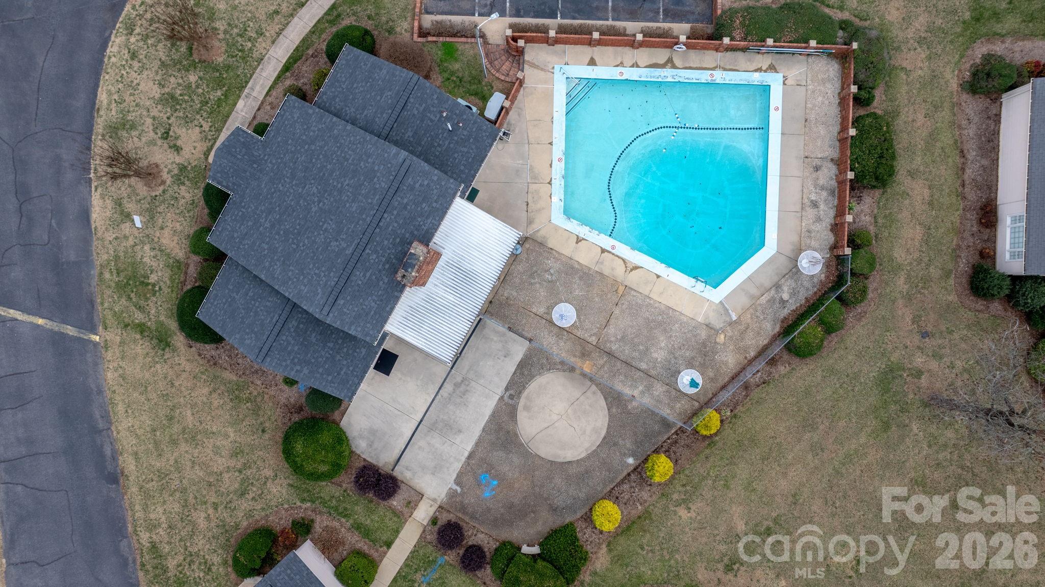 2705 North Center Street, Unit 60 Hickory, NC 28601 - Photo 25 of 27 an aerial view of a house with a swimming pool