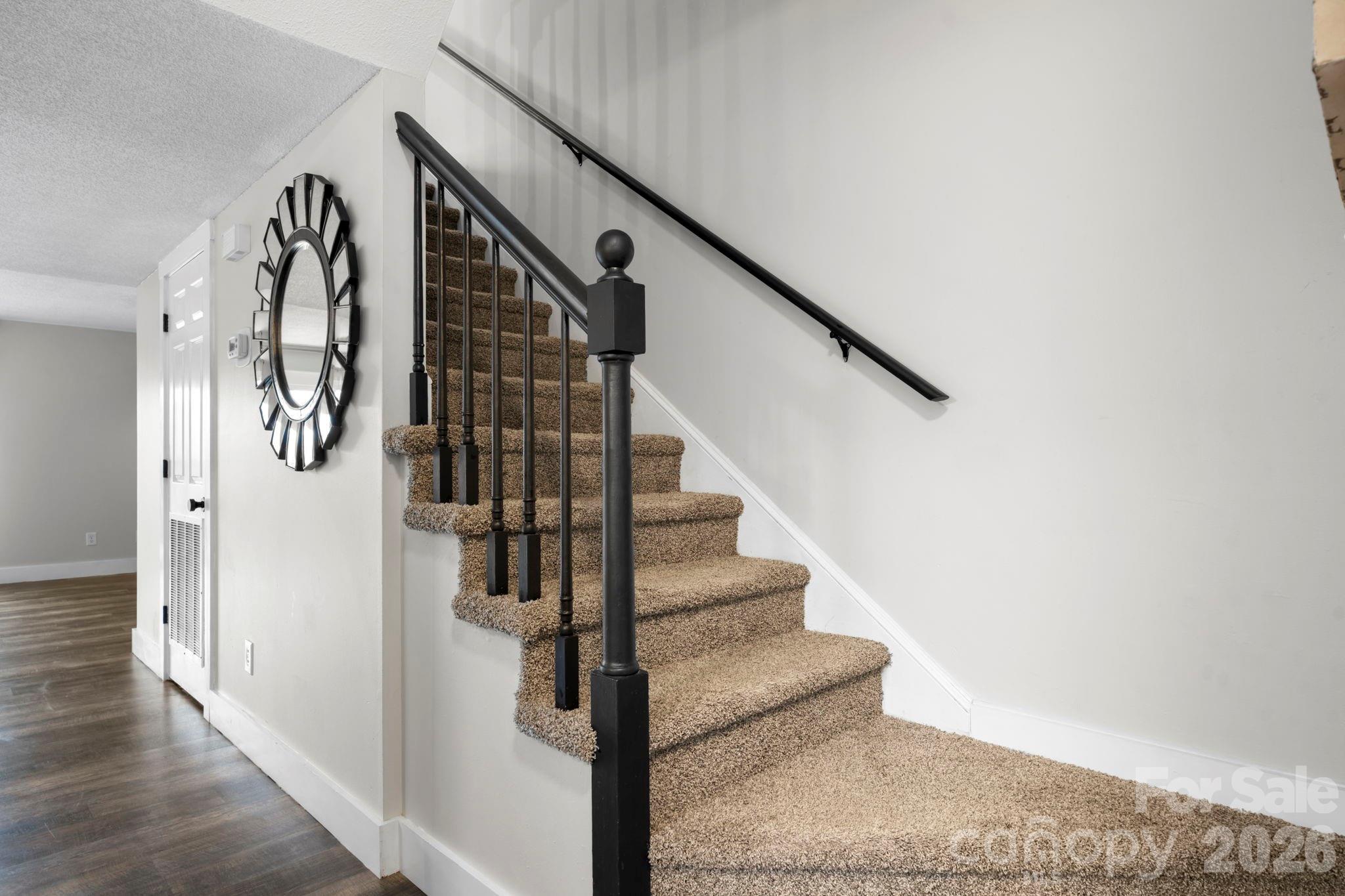 2705 North Center Street, Unit 60 Hickory, NC 28601 - Photo 3 of 27 a view of entryway and gallery with wooden floor