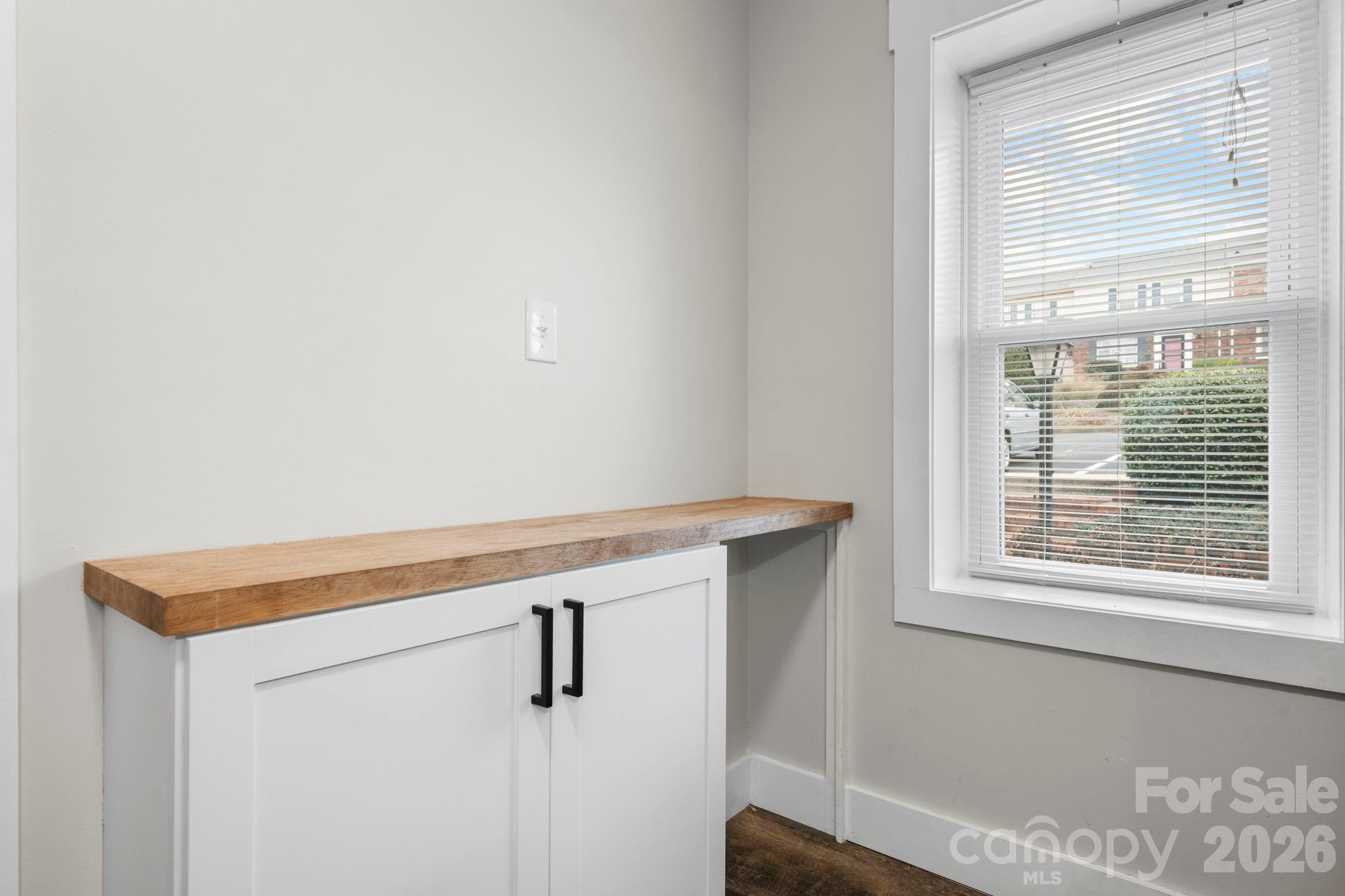 2705 North Center Street, Unit 60 Hickory, NC 28601 - Photo 10 of 27 a view of a room with rack on the wall
