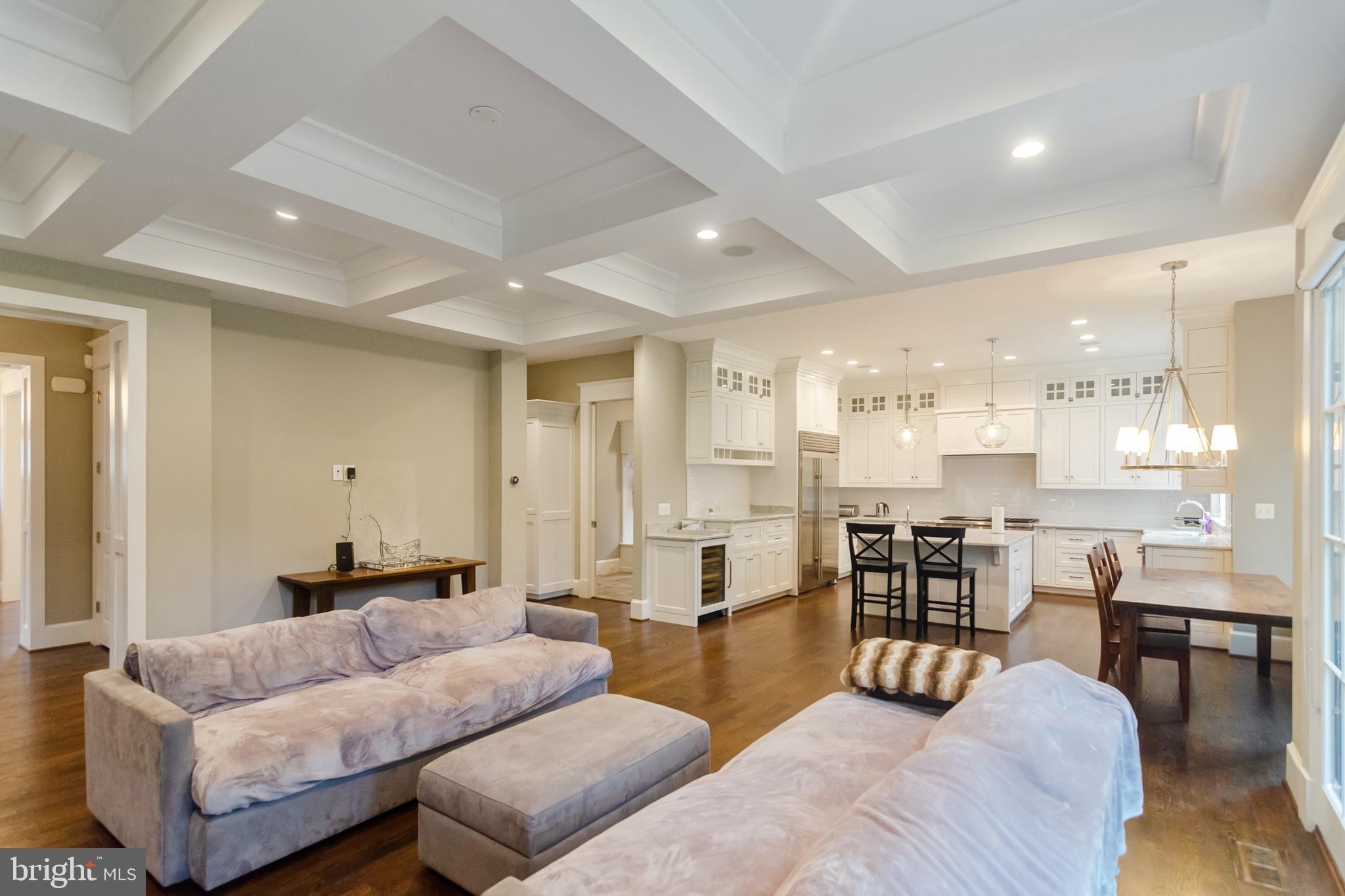 6801 Danforth Street McLean, VA 22101 - Photo 11 of 29 a living room with furniture kitchen and a table