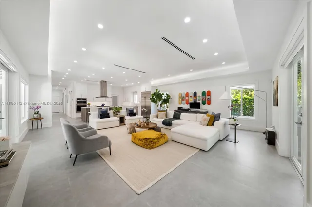 a living room with furniture and a table