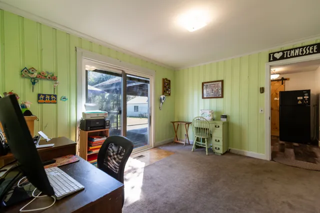 a bedroom with furniture and a window