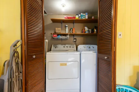a utility room with dryer and washer