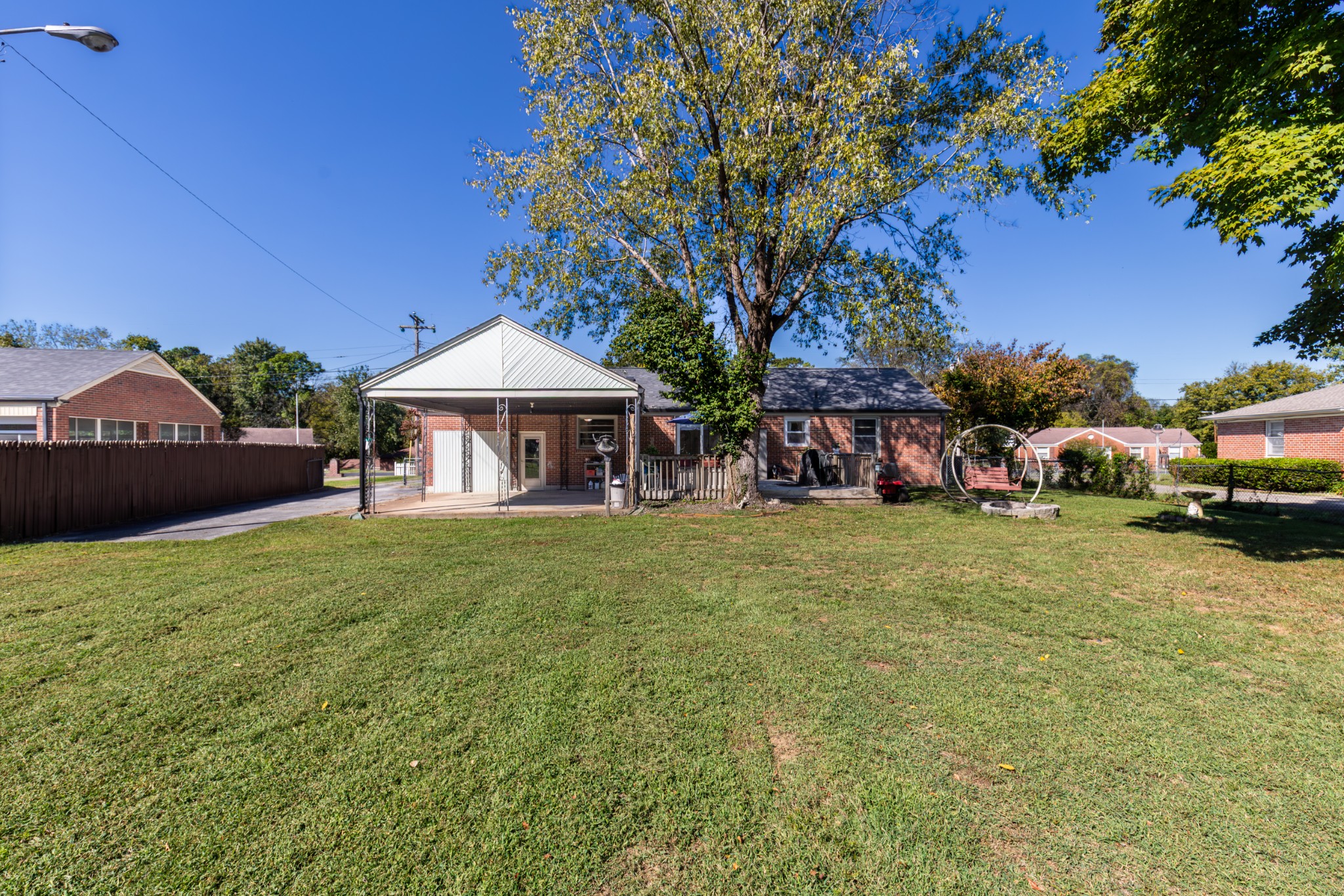 405 School Pass Madison, TN 37115 - Photo 20 of 28 a front view of a house with a garden