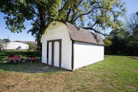 a view of outdoor space yard and garage