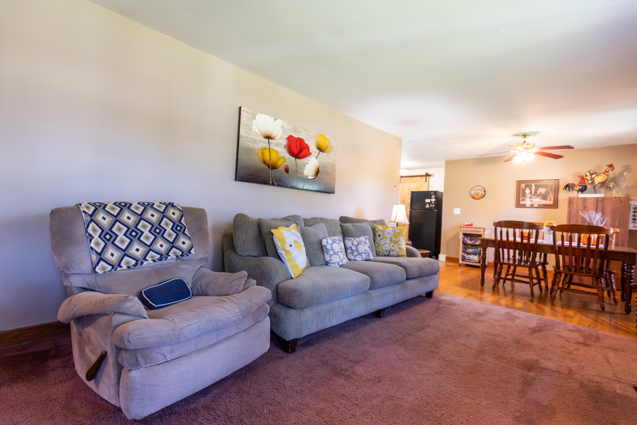 405 School Pass Madison, TN 37115 - Photo 6 of 28 a living room with furniture and a dining table with bookshelf