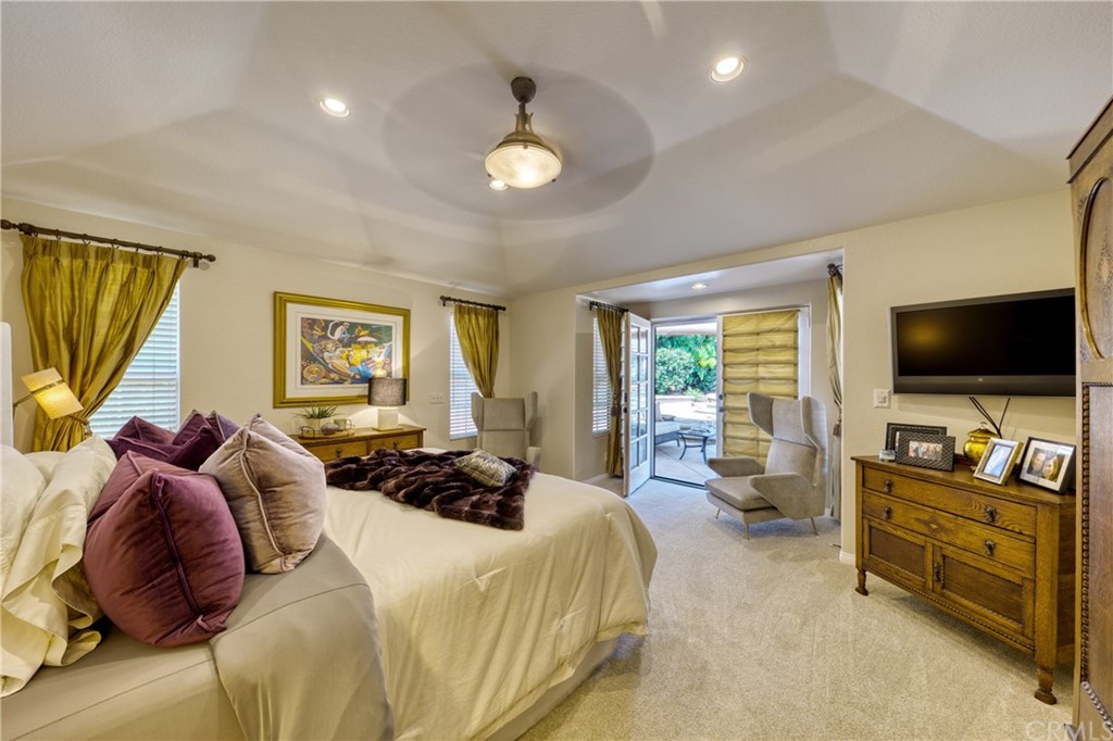 200 North Sunset Place Monrovia, CA 91016 - Photo 13 of 44 a bedroom with furniture and a flat screen tv