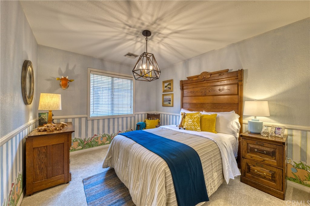 200 North Sunset Place Monrovia, CA 91016 - Photo 20 of 44 a bedroom with bed and wooden floor