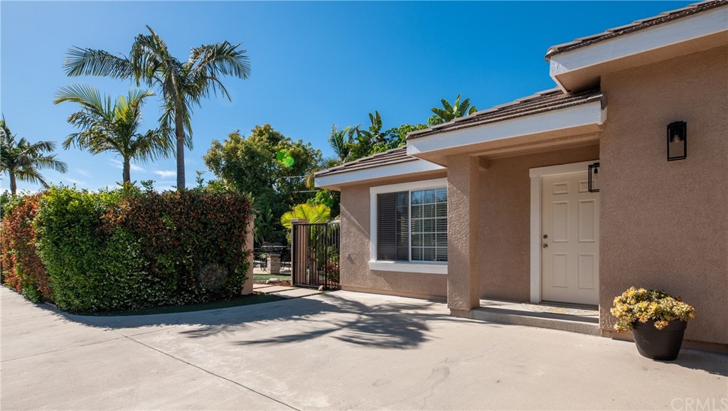 200 North Sunset Place Monrovia, CA 91016 - Photo 37 of 44 a front view of a house with a yard and a garage