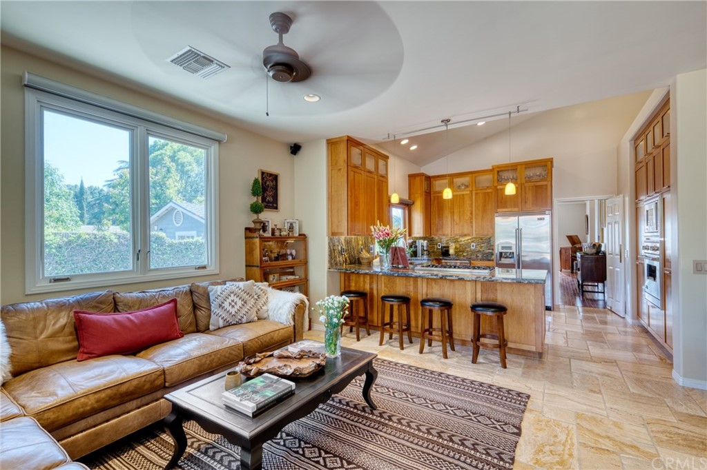 200 North Sunset Place Monrovia, CA 91016 - Photo 4 of 44 a living room with furniture a table and a large window
