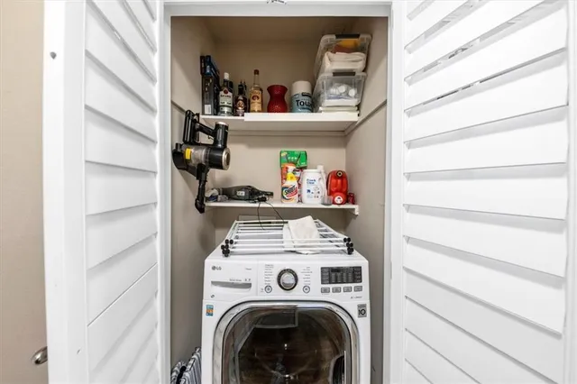 a view of washer and dryer in a utility room